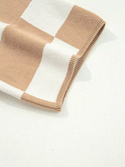 Beige and white checkered knit blanket sweater with ribbed edges