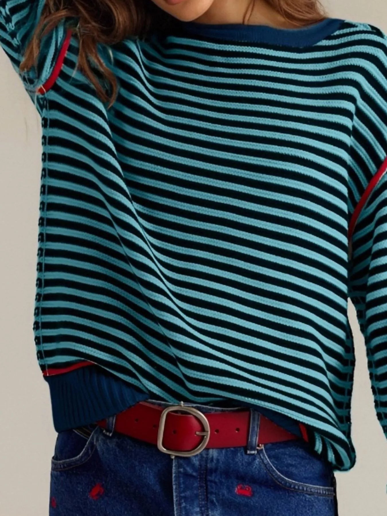 Teal and navy striped round neck long sleeve sweater with red trim