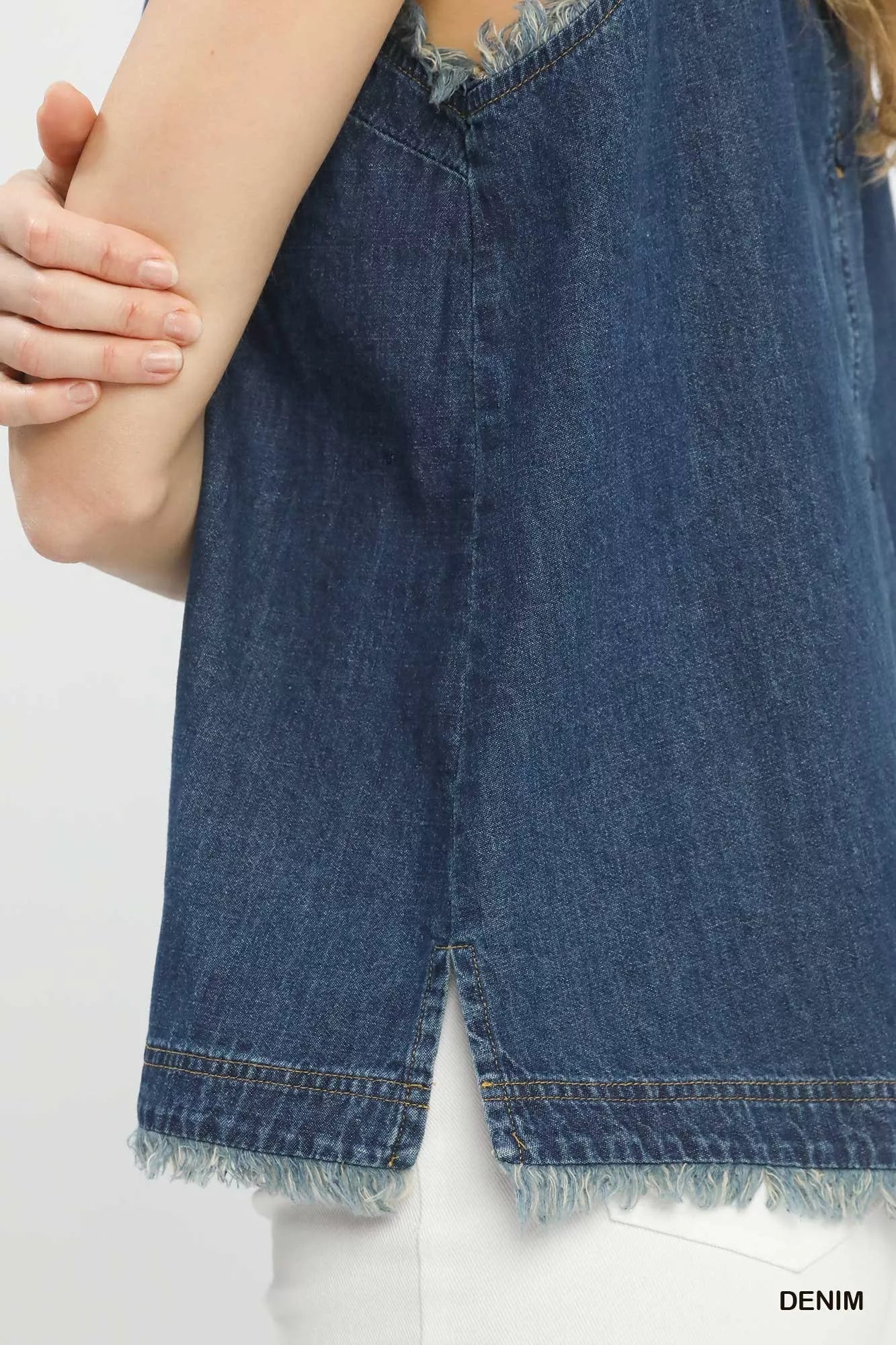 Umgee sleeveless fringe hem denim top in blue with frayed edges