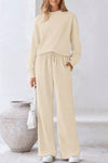 Cream-colored ribbed knit womens sweatsuit set with drawstring waist