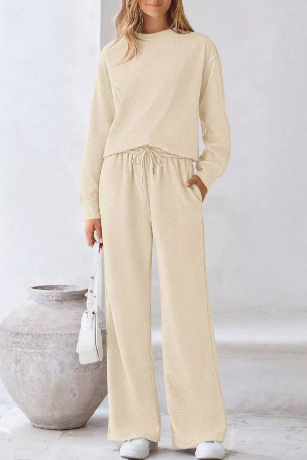 Cream-colored ribbed knit womens sweatsuit set with drawstring waist