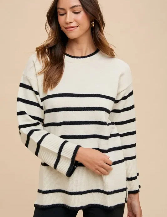 Black and white striped Annie Wear side slit round neck knit sweater