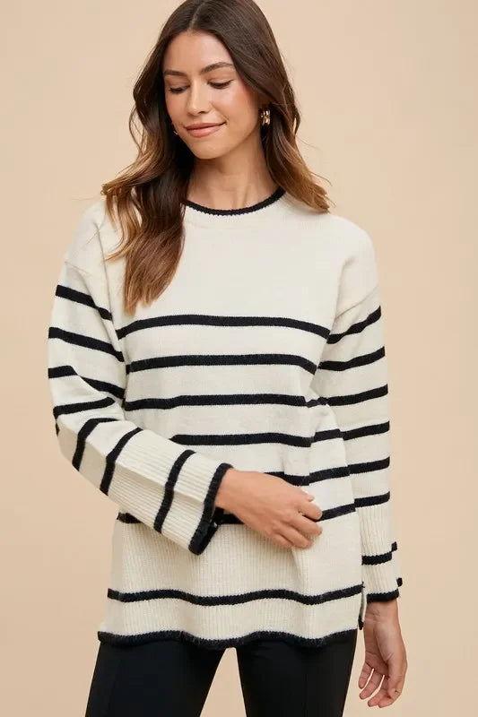 Black and white striped Annie Wear side slit round neck knit sweater