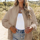 Women’s beige quilted bomber jacket with baseball collar and zipper