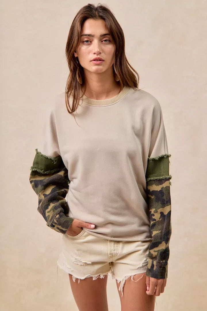 BiBi Camo Sleeve French Terry Top with Frayed Edge | Daverri Fashions