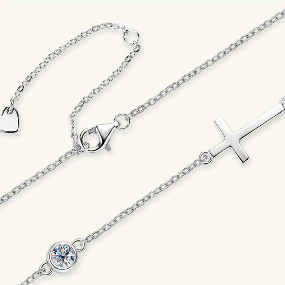 Silver necklace with heart, moissanite round stone and silver cross
