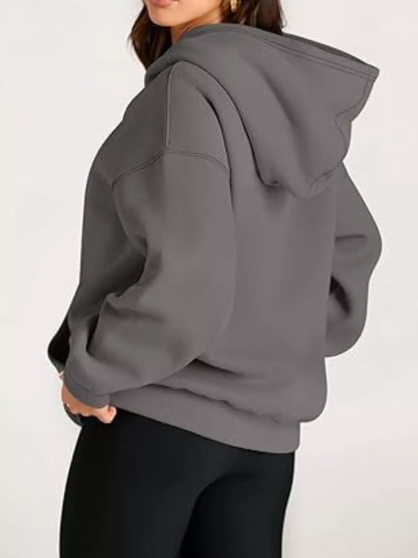 Soft oversized gray kangaroo pocket long sleeve hoodie with relaxed fit and ribbed cuffs
