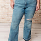 Isla Mid Rise Distressed Released Hem Bootcut Jeans Womens
