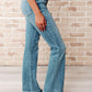Isla Mid Rise Distressed Released Hem Bootcut Jeans Womens