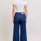 Judy Blue high-waisted retro wide-leg denim jeans with pink patch