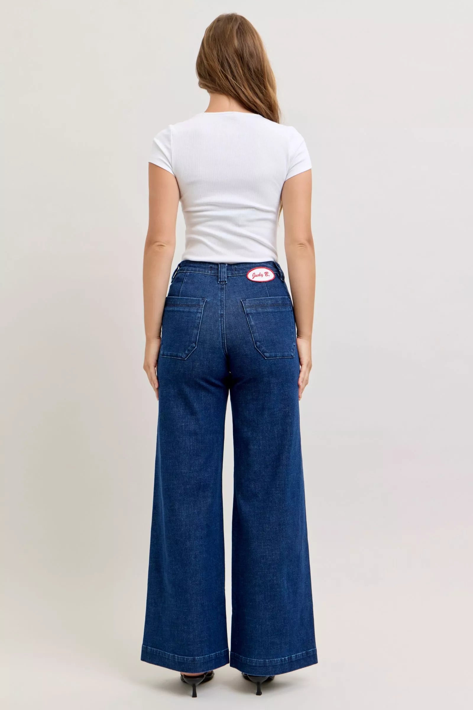 Judy Blue high-waisted retro wide-leg denim jeans with pink patch