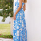 Printed tie-front maxi dress in vibrant blue with white geometric botanical print