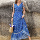 Blue printed V-neck maxi dress with tie-sleeve straps and tiered hemline