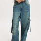 Vintage Wash Wide Leg Cargo Jeans in medium-wash blue with side pocket drawstrings