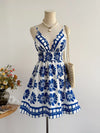 Floral print v-neck mini sundress with spaghetti straps and elastic waistband