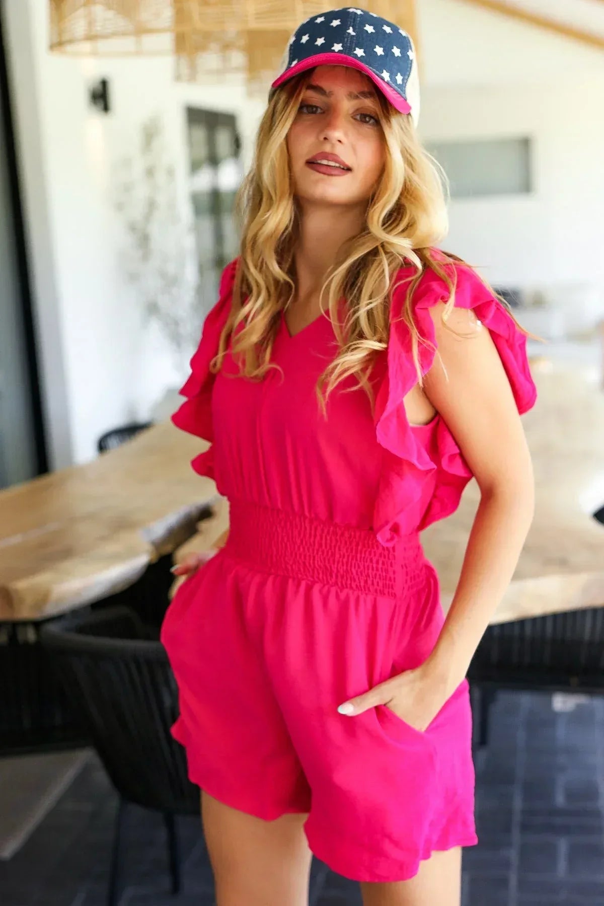 Feeling Femme' Fuchsia Smocked Waist V Neck Flutter Sleeve Romper - DAVERRI FASHIONS