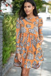 Rust Animal Geo Print Swing Dress with Pockets | Daverri Fashions