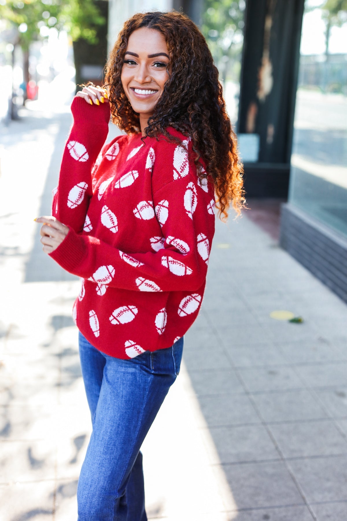 Red long-sleeved Haptics Game Day football print sweater