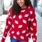 Red knit sweater with white football patterns, Haptics Game Day jacquard