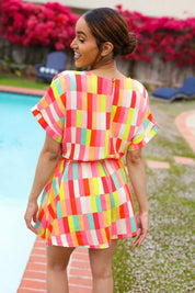 Eyes On You Coral Geo Abstract Surplice Woven Romper | Daverri Fashions