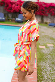 Eyes On You Coral Geo Abstract Surplice Woven Romper | Daverri Fashions