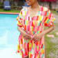 Eyes On You Coral Geo Abstract Surplice Woven Romper - DAVERRI FASHIONS