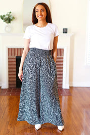 Let's Meet Up Black Animal Print Smocked Waist Palazzo Pants | Daverri Fashions