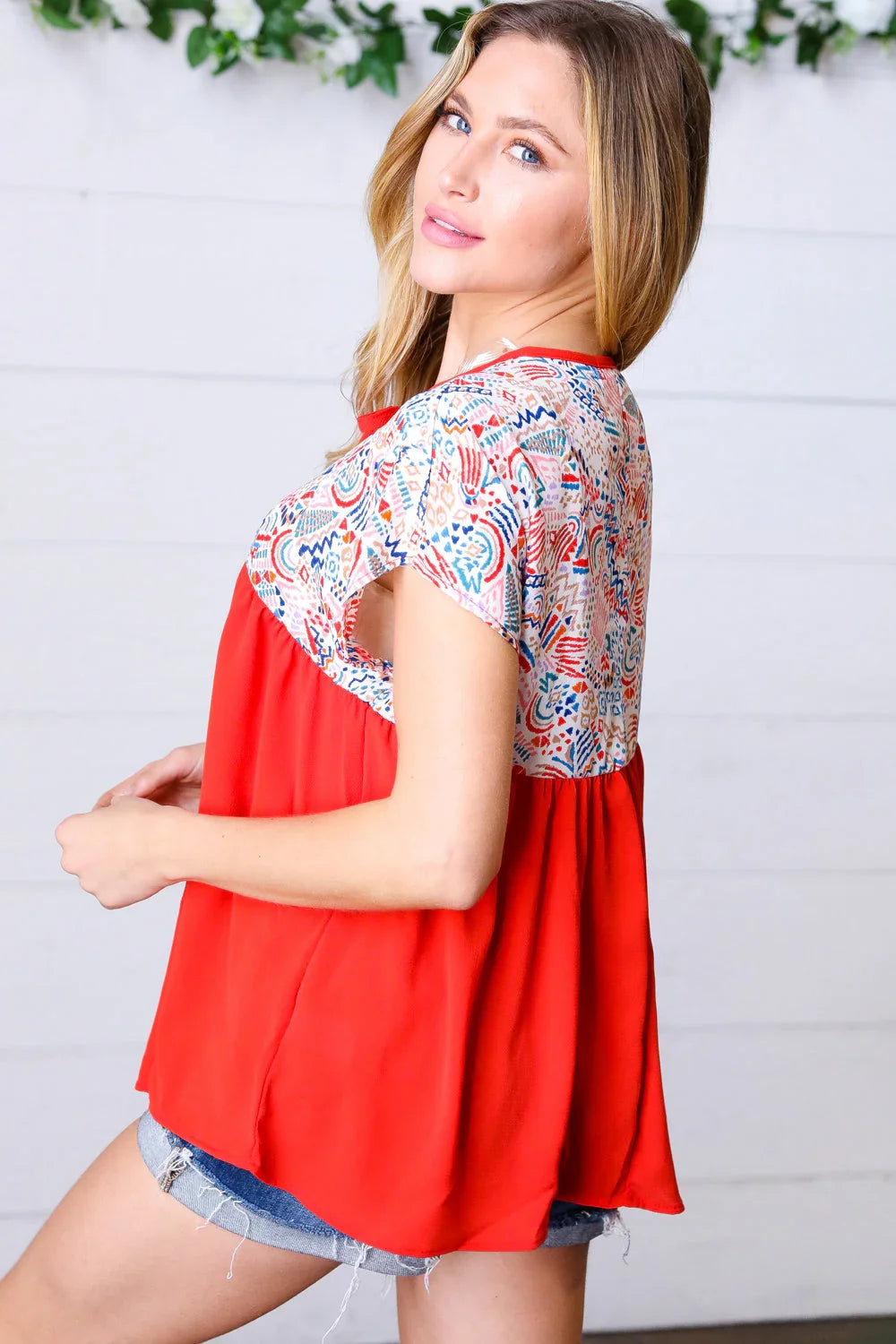Red boho print tie neck dolman top with short sleeves