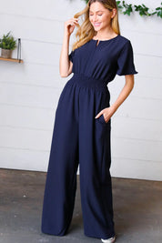 Dark Blue Smocked Waist Notch Neck Crepe Jumpsuit | Daverri Fashions