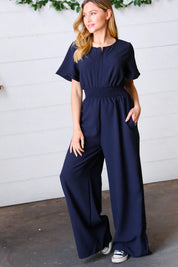 Dark Blue Smocked Waist Notch Neck Crepe Jumpsuit | Daverri Fashions