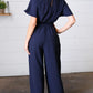 Dark Blue Smocked Waist Notch Neck Crepe Jumpsuit - DAVERRI FASHIONS