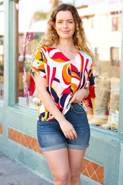 Orange Geometric V Neck Drop Shoulder Top | 07-01-25 Summer Sale Daverri Fashions