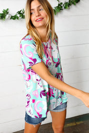 Turquoise & Purple Flat Floral Print Top | Daverri Fashions