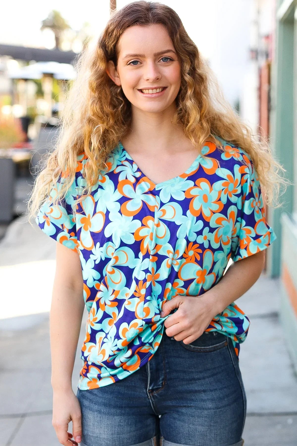 Blue & Orange Flat Floral V Neck Top | Daverri Fashions