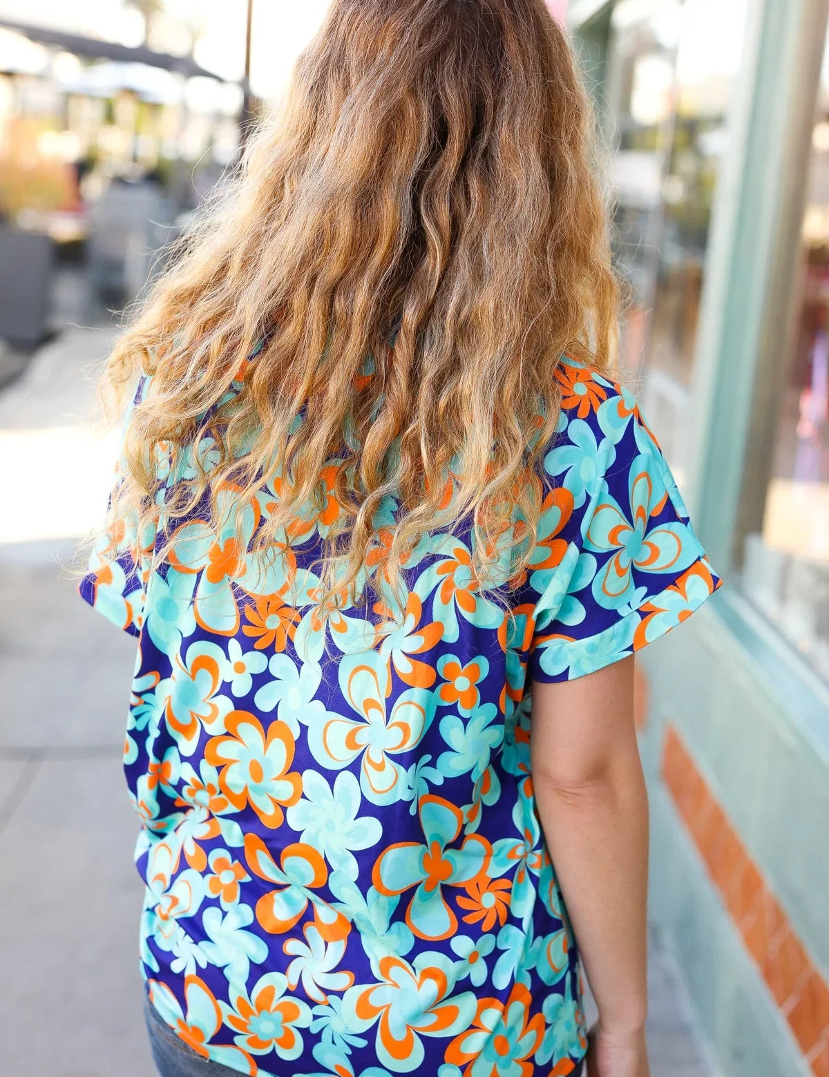 Blue & Orange Flat Floral V Neck Top | Daverri Fashions