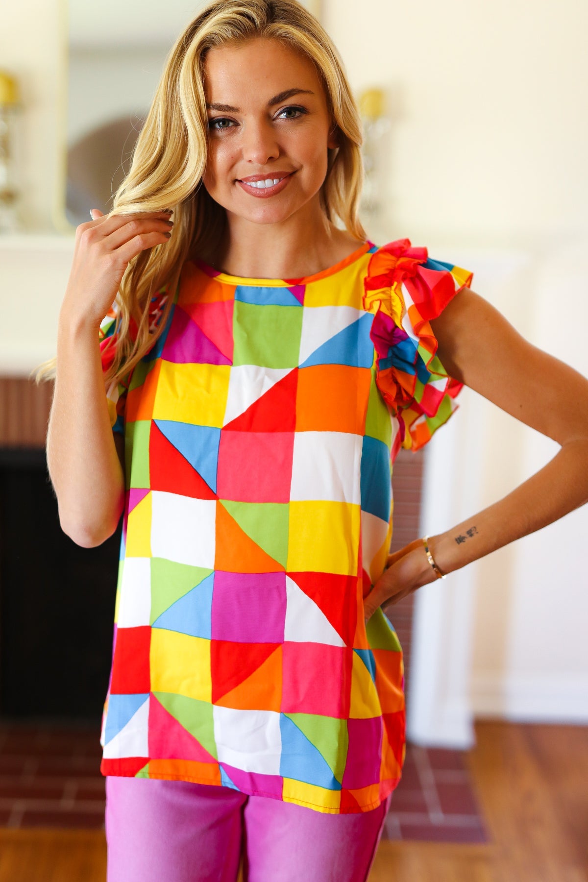 Red geometric print double ruffle sleeve top in vibrant rainbow colors