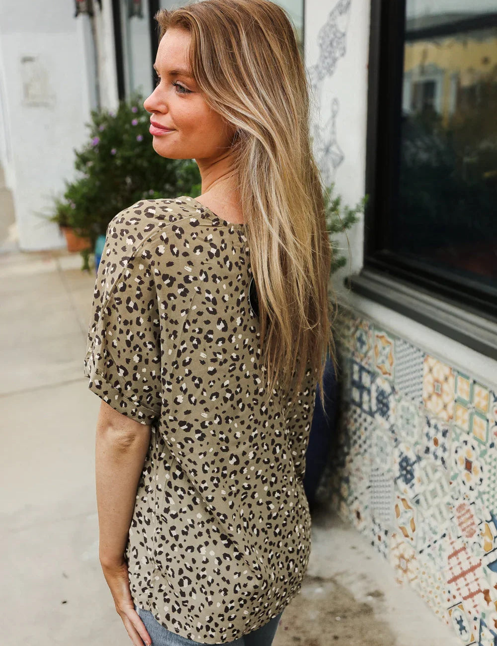 Best In Bold Sage Animal Print V Neck Dolman Side Slit Top | Daverri Fashions