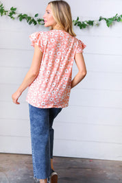 Peach Floral Print Frilled Short Sleeve Yoke Top | Daverri Fashions
