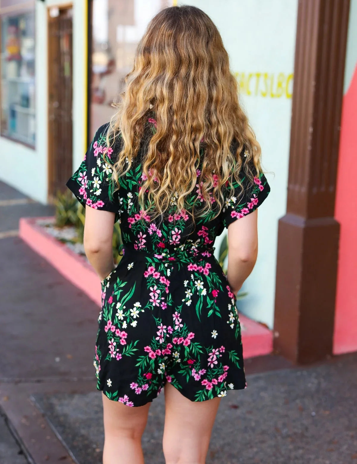 Black & Floral Surplice Short Sleeve Pocketed Romper | Daverri Fashions