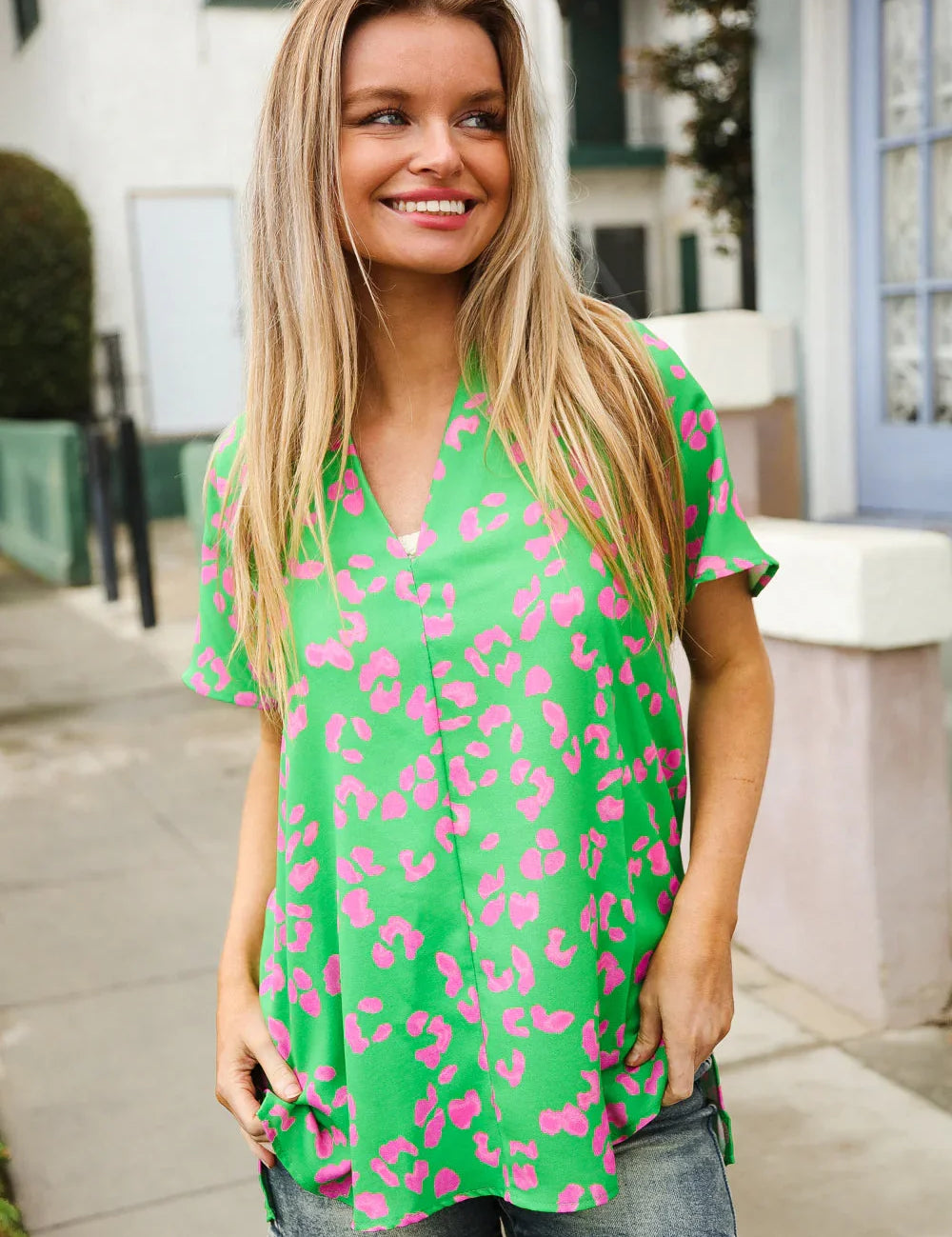 Follow Me Green Animal Print V Neck Short Sleeve Blouse | Daverri Fashions