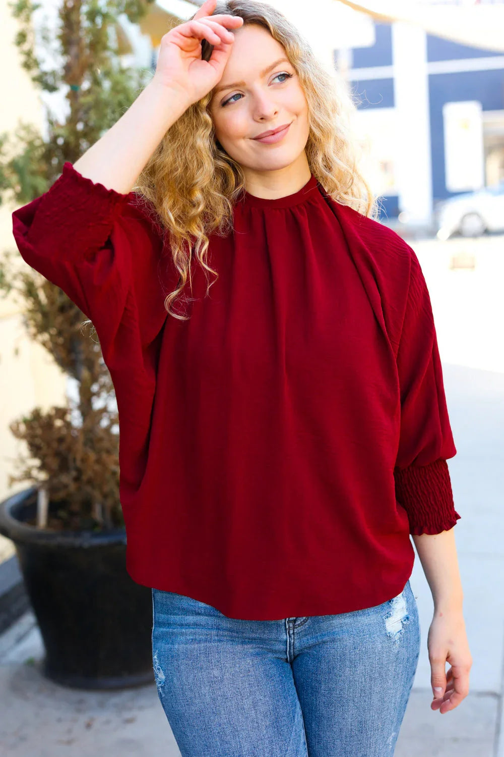 Bold Dreams Wine Smocked Three Quarter Sleeve Tie Back Top | Daverri Fashions