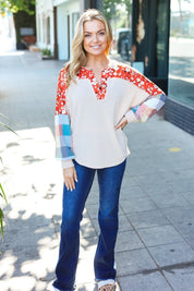 Cream and red Feeling Femme oatmeal plaid floral blouse with jeans, leopard sneakers