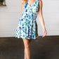 Lovely In Green & Blue Floral Sleeveless Surplice Romper - DAVERRI FASHIONS