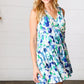 Lovely In Green & Blue Floral Sleeveless Surplice Romper - DAVERRI FASHIONS