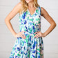 Lovely In Green & Blue Floral Sleeveless Surplice Romper - DAVERRI FASHIONS
