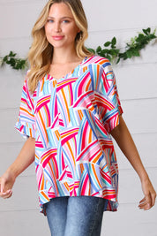 Blue & Fuchsia Geometric Print Woven Top | Daverri Fashions