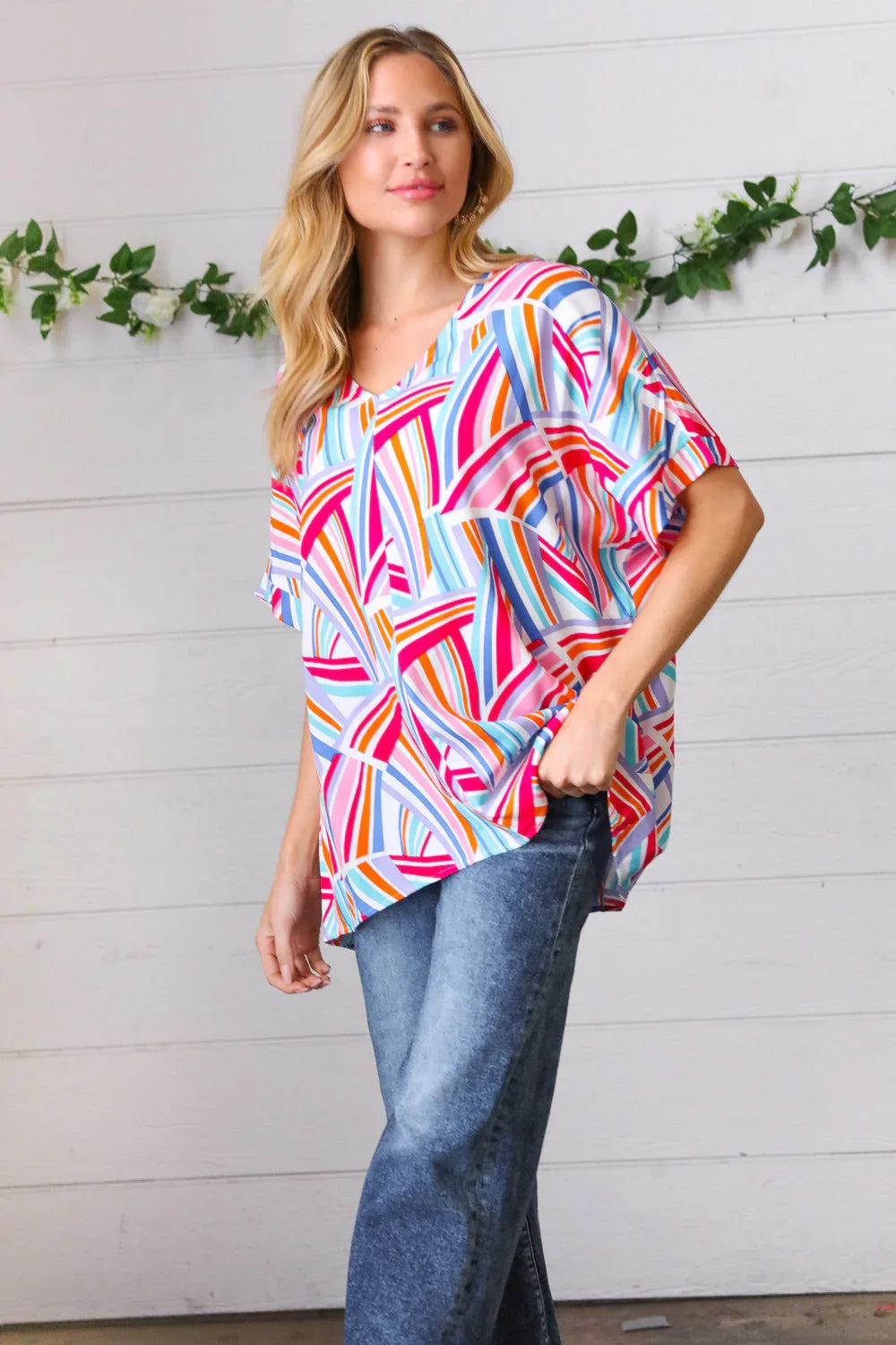Blue & Fuchsia Geometric Print Woven Top | Daverri Fashions