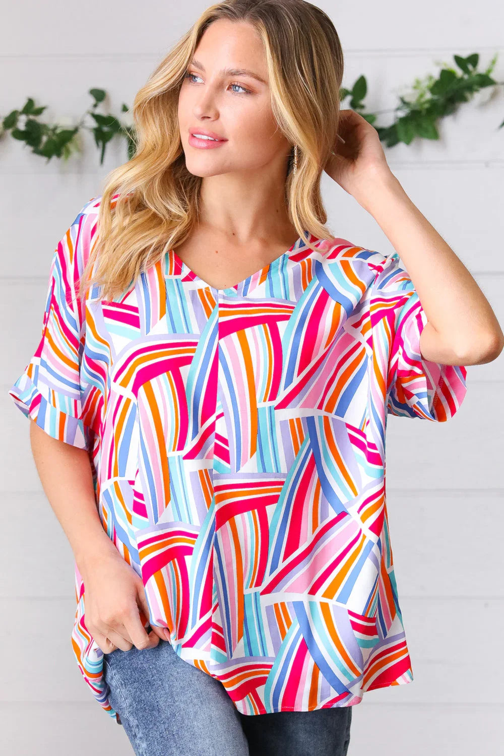 Blue & Fuchsia Geometric Print Woven Top | Daverri Fashions