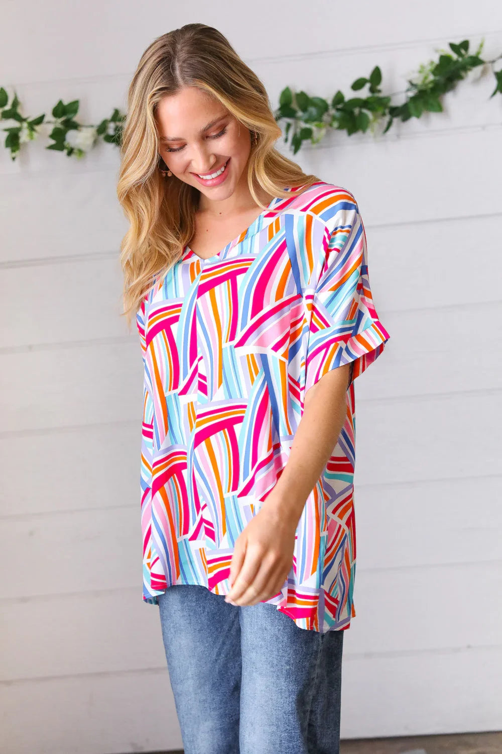 Blue & Fuchsia Geometric Print Woven Top | Daverri Fashions