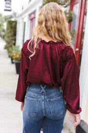 Holiday Vibes Burgundy Frill Detail Tie Neck Satin Top | Daverri Fashions